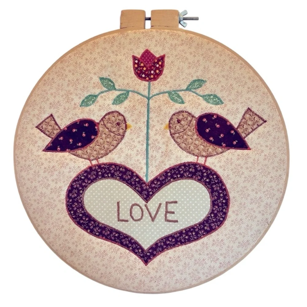 Vintage Appliqué Hoop Art with Two Brown Lovebirds and the Word Love in a Heart.
